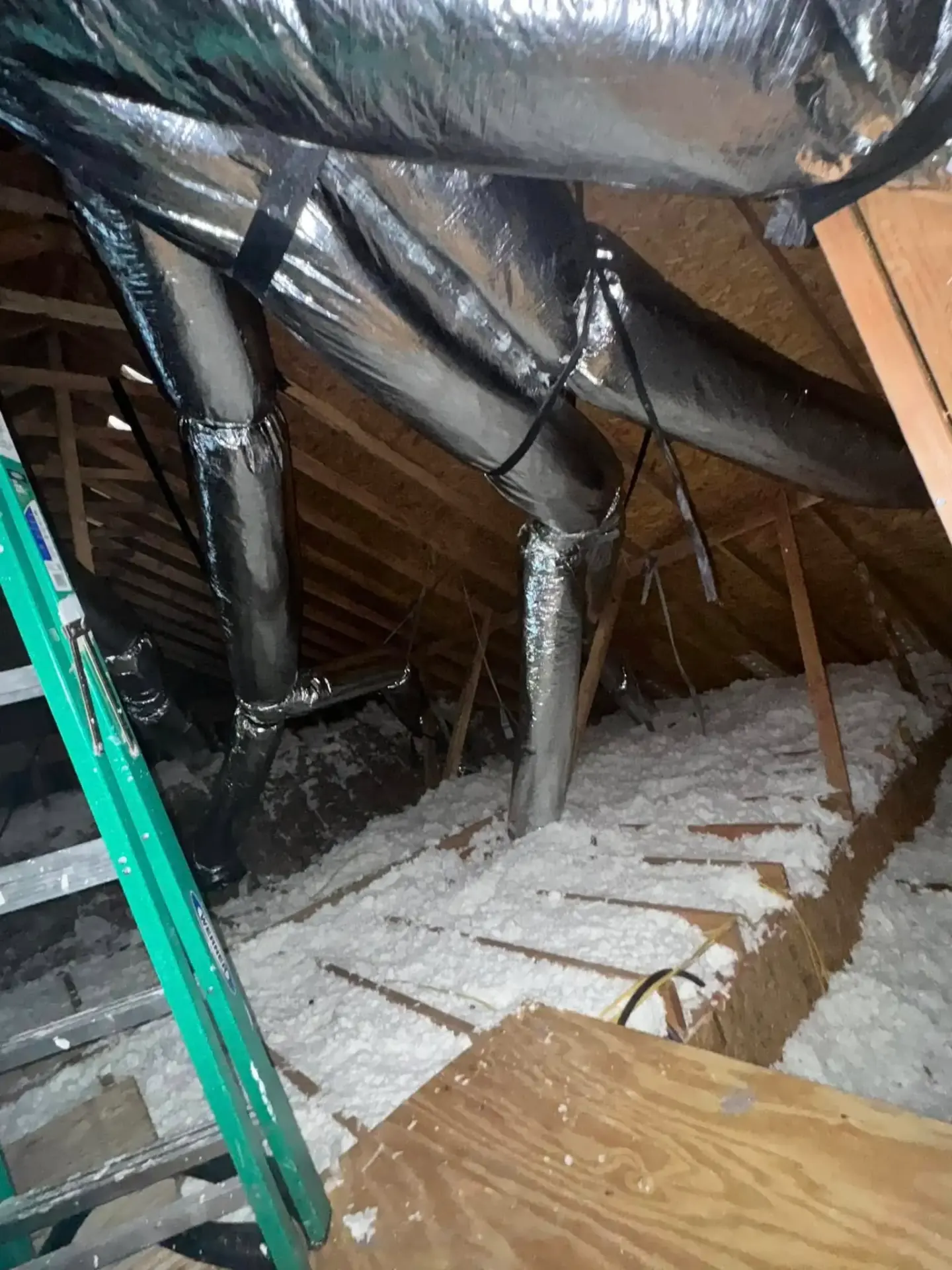 Clean, properly insulated black ductwork after professional NADCA-compliant cleaning service