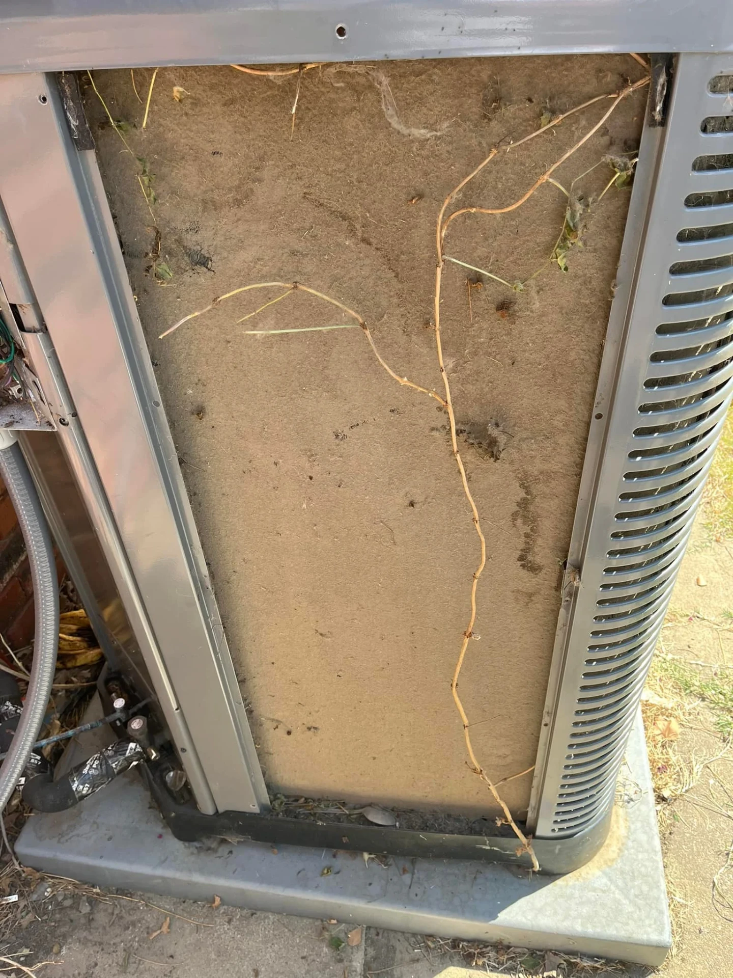 Dirty AC coil before professional cleaning showing reduced efficiency